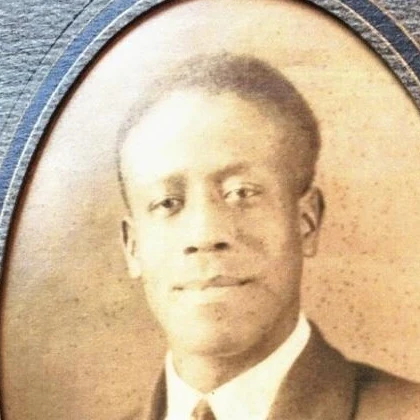Archival oval portrait of Otis Benjamin Cash, Sr. in a suit and tie